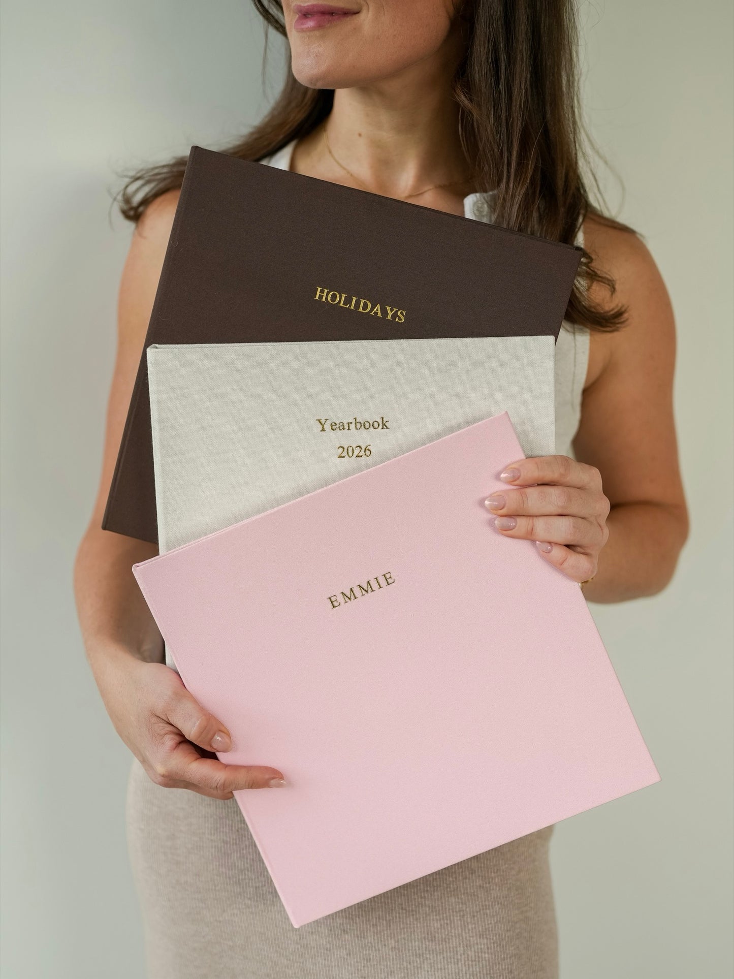 Three bespoke albums personalised in gold foil