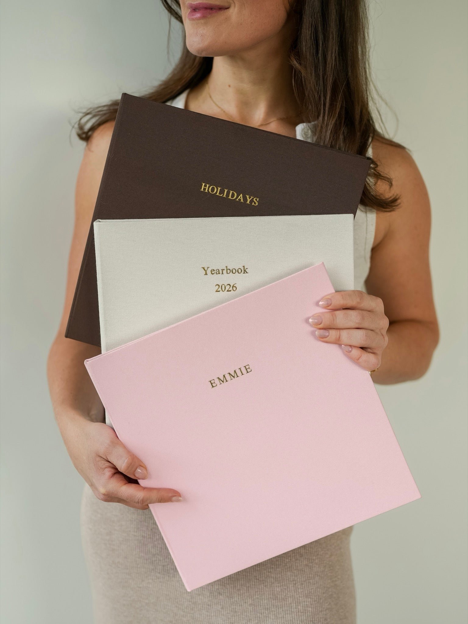 Three bespoke albums personalised in gold foil