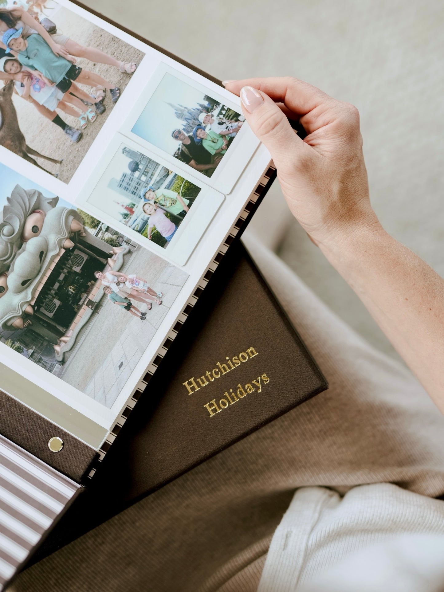 Cocoa bespoke album open with holiday photographs