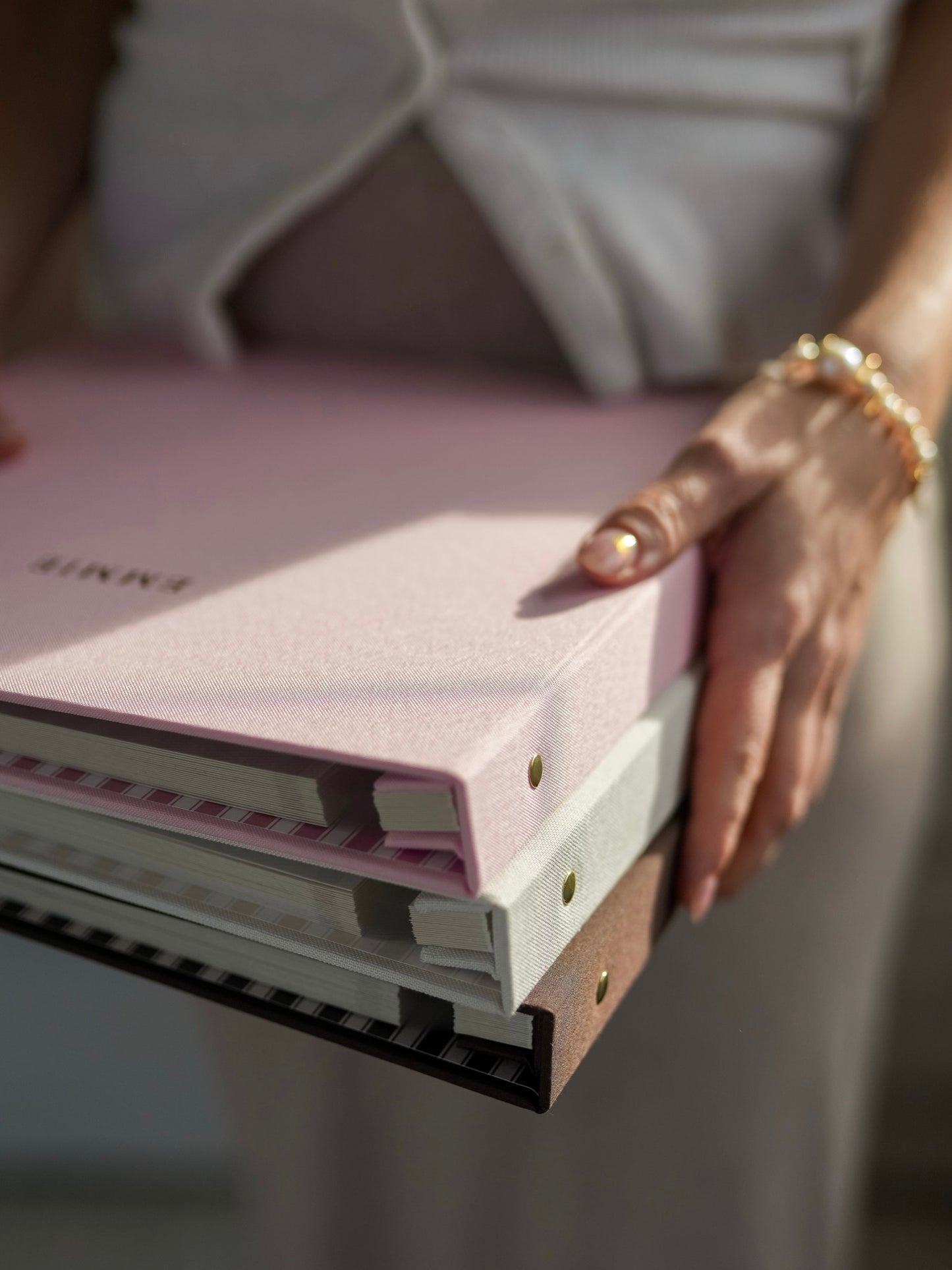 Brass screw binding on the bespoke linen photo album