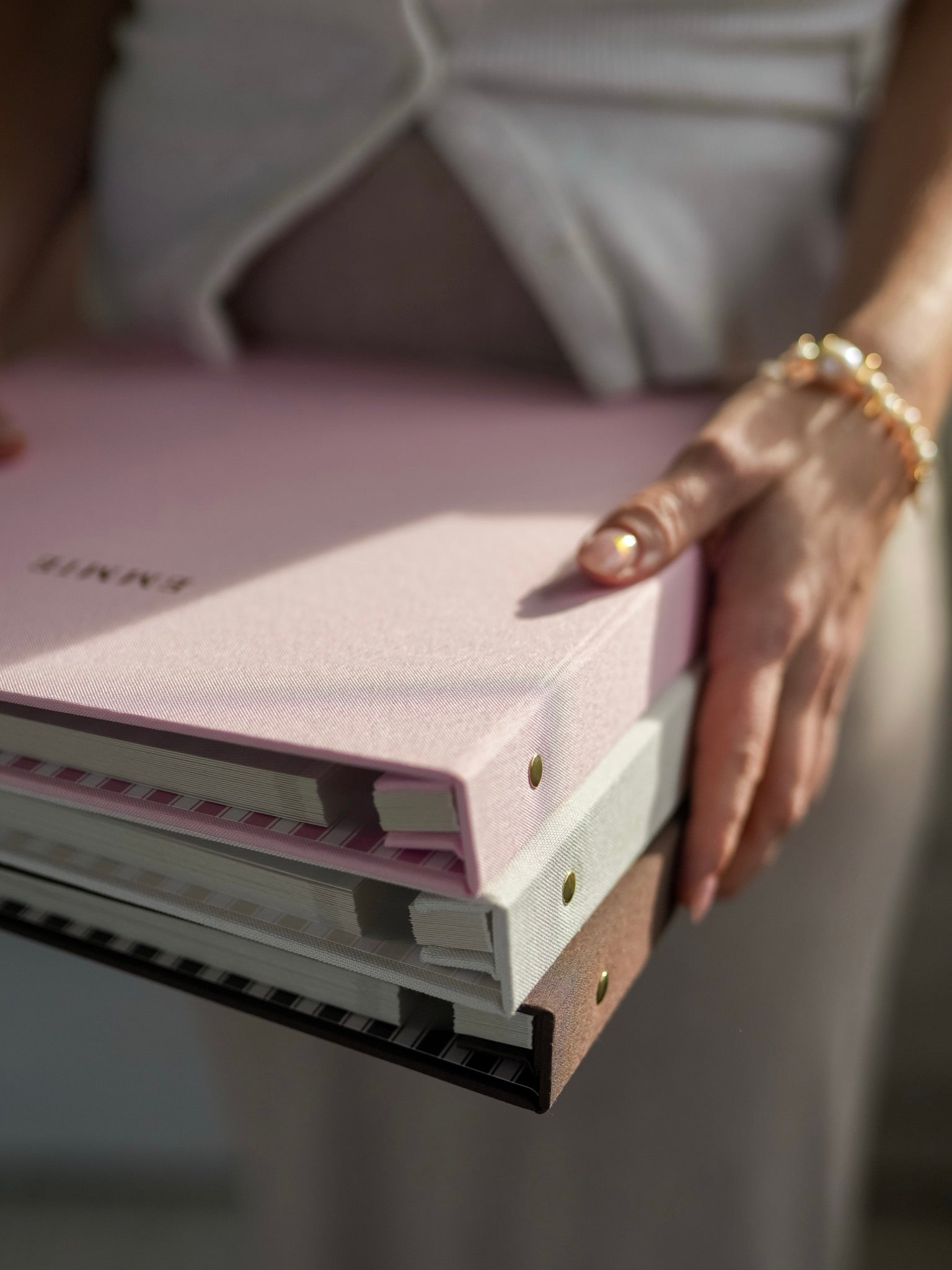 Brass screw binding on the bespoke linen photo album